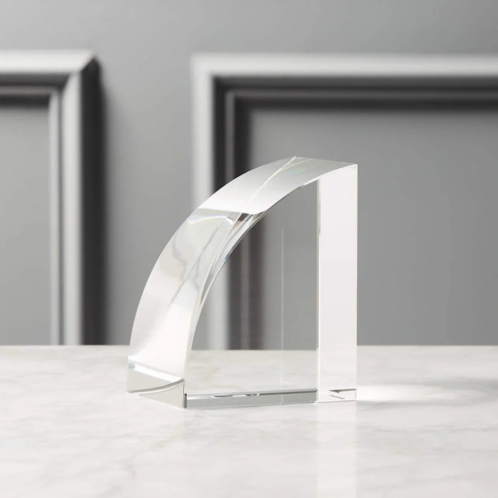 CB2 Silver Curved Acrylic Bookend